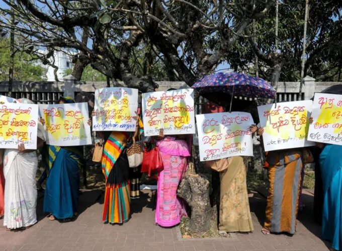 State teachers and school principals hold placards during a protest demanding relief from the upcoming budget, in front of the Ministry of Education in Colombo, Sri Lanka, February 14, 2025. © 2025 CHAMILA KARUNARATHNE/EPA-EFE/Shutterstock
