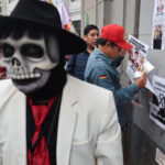 People attend a vigil in memory of Mauricio Ruiz, a 32-year-old rapper killed in Wednesday's protests against Peruvian President Jose Jeri, in Lima, Peru, on October 16, 2025 [Sebastian Castaneda/Reuters]