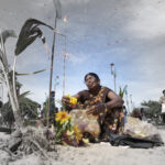 Families mourn victims of Sri Lanka’s 1983-2009 civil war on the beach at Mullivaikal where the final battle took place, May 17, 2024. © 2024 Eranga Jayawardena/AP Photo